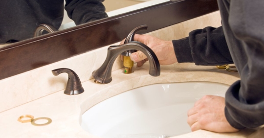 installing new plumbing fixture